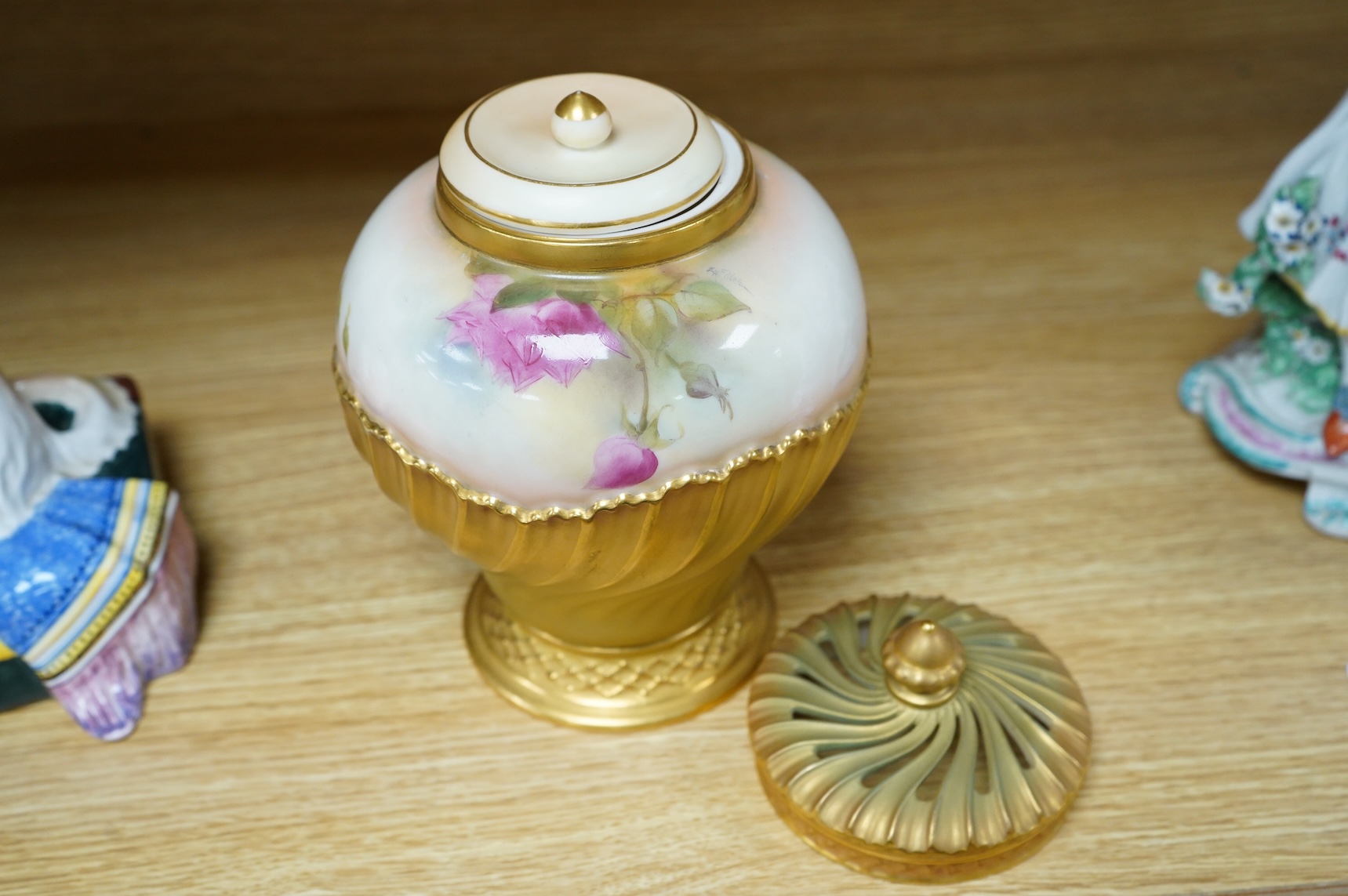 A Worcester pot pourri, cover and liner, signed E.M. Fildes, 20cm high